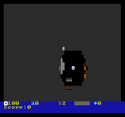 A dark room lit by a torch around the player